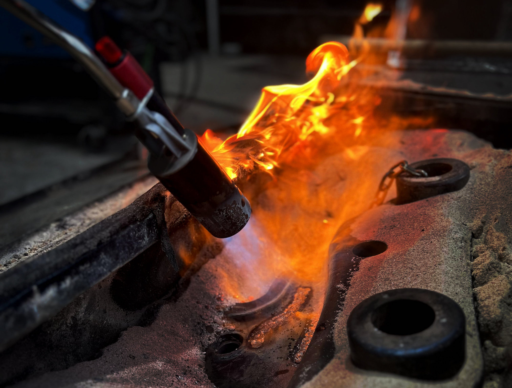 A welding torch creates a spectacular blue flame.